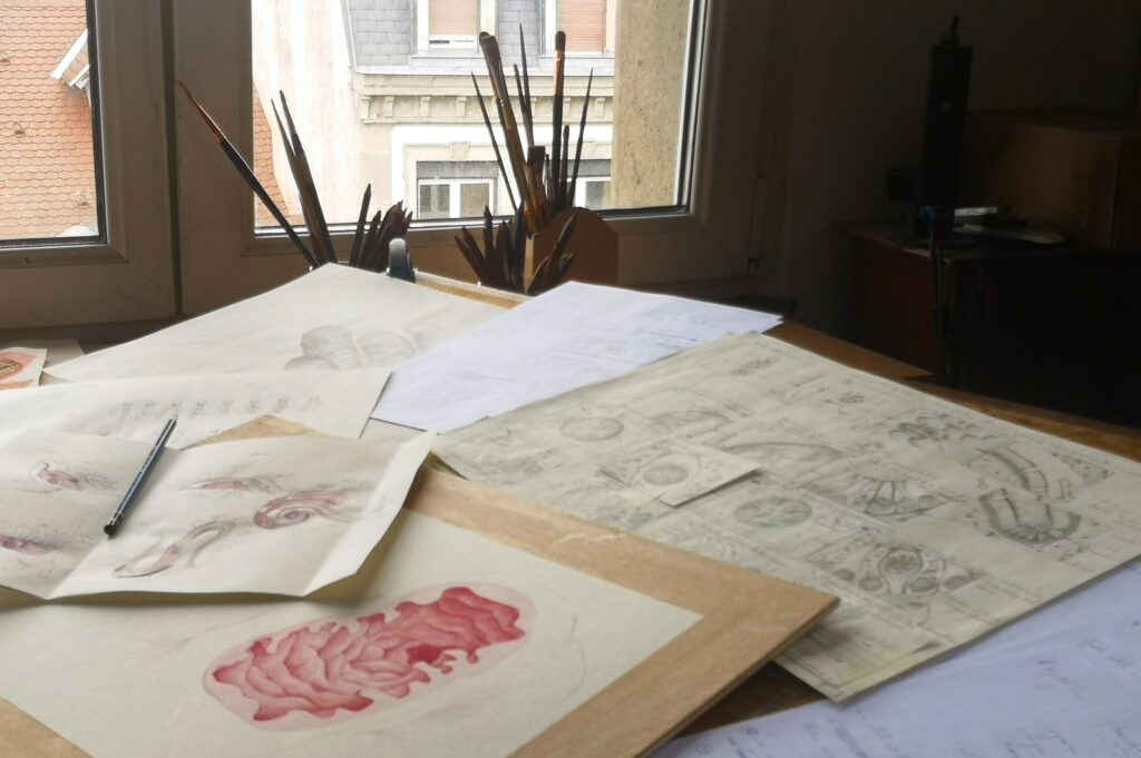 A few drawings on a desktop